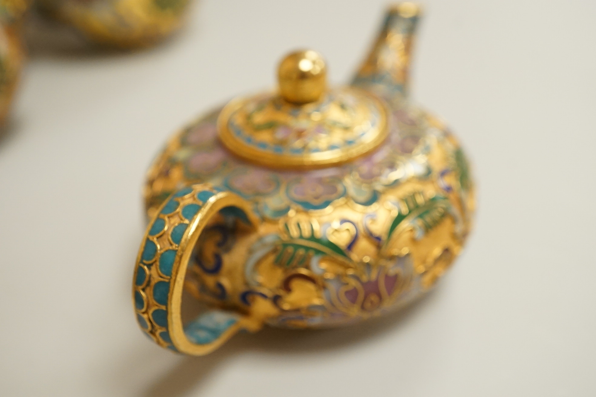 A collection of miniature enamel and cloisonné boxes, eggs and a painted rabbit, etc. (11)